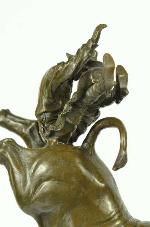 Bronze Rodeo cowboy and bull  J.P.Mene
