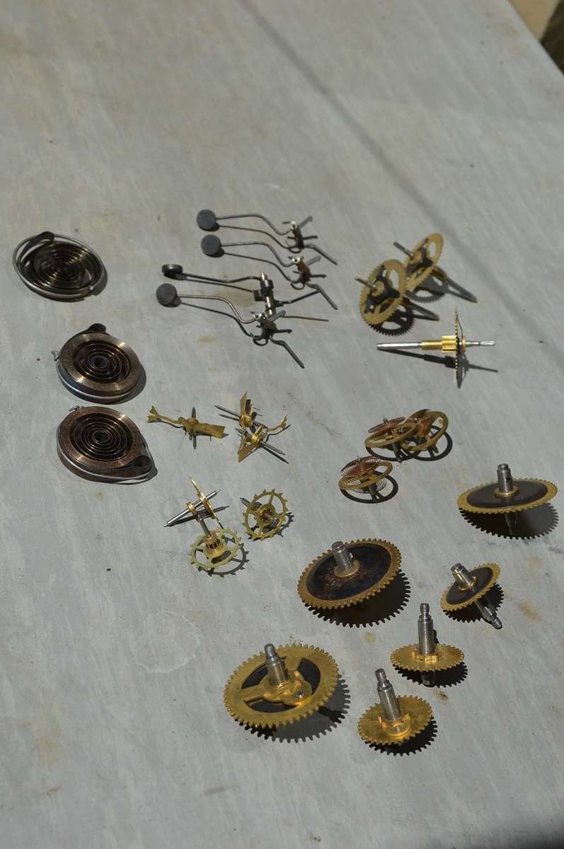 Various matching NEW clock spares