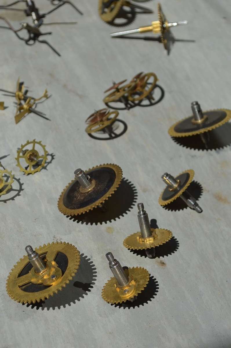 Various matching NEW clock spares