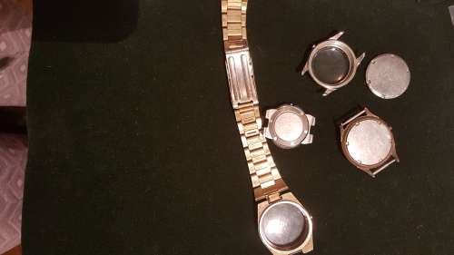 4 Vintage Omega watch housings and 1x strap