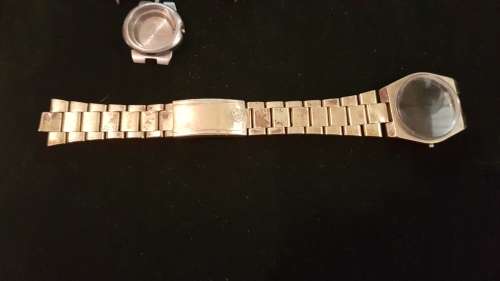 4 Vintage Omega watch housings and 1x strap