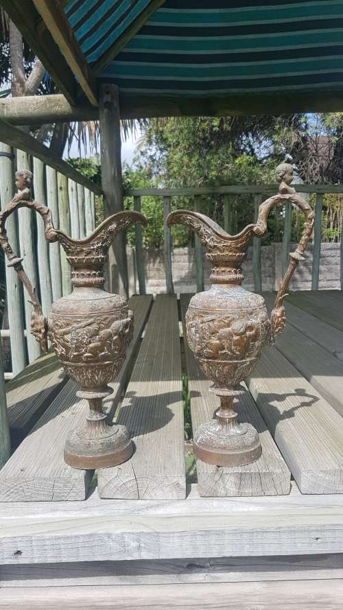 Pair of Vintage embossed 36cm cherub urns