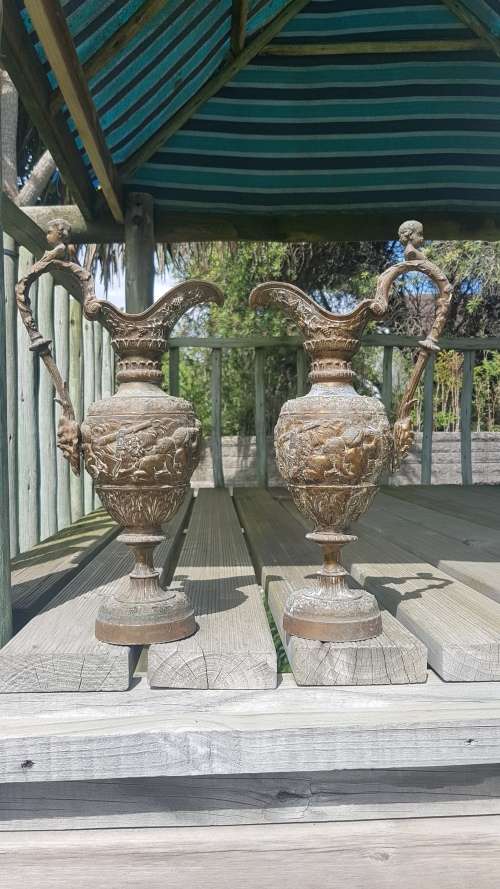 Pair of Vintage embossed 36cm cherub urns