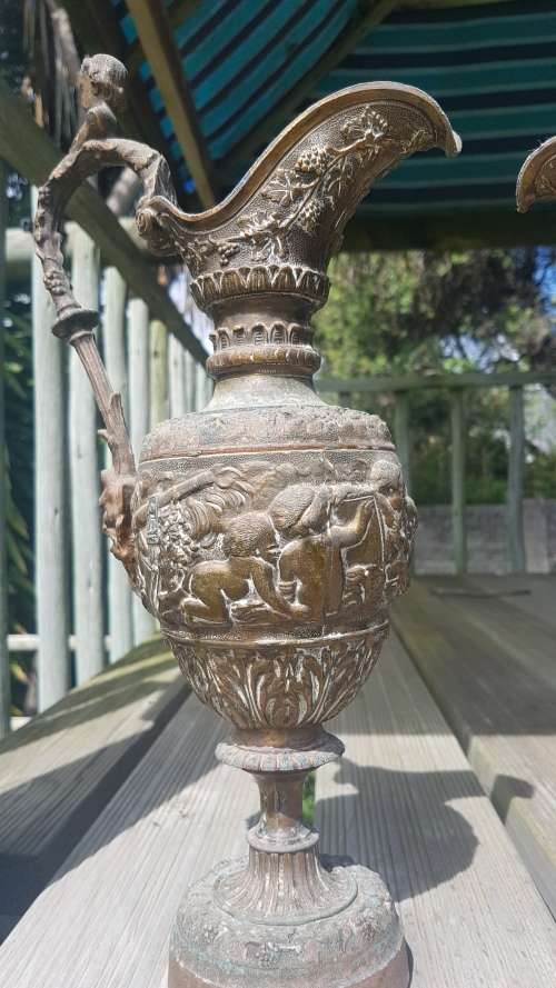 Pair of Vintage embossed 36cm cherub urns