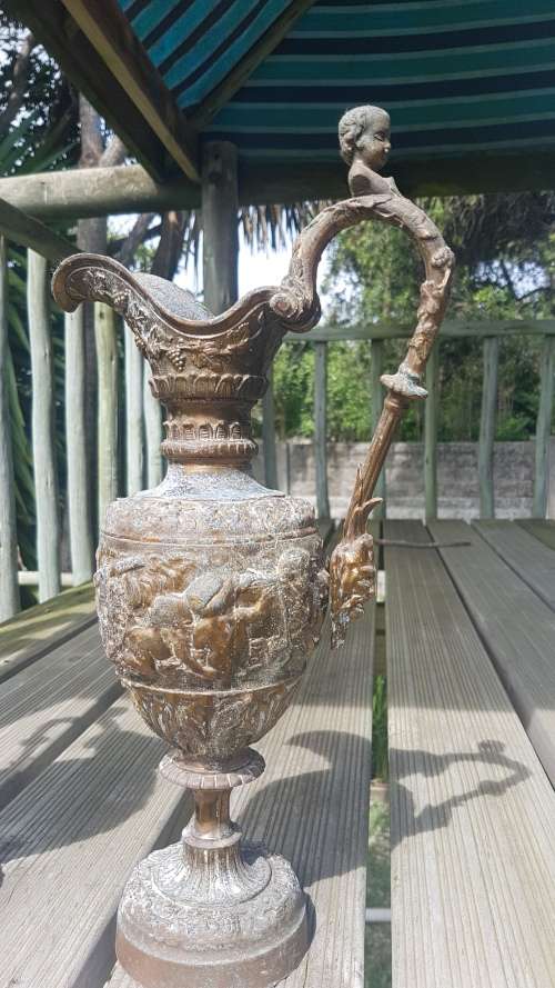Pair of Vintage embossed 36cm cherub urns