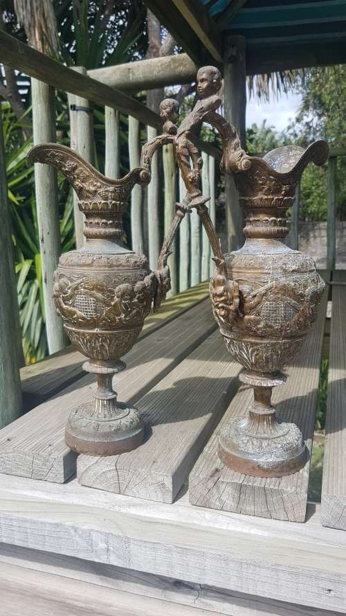 Pair of Vintage embossed 36cm cherub urns