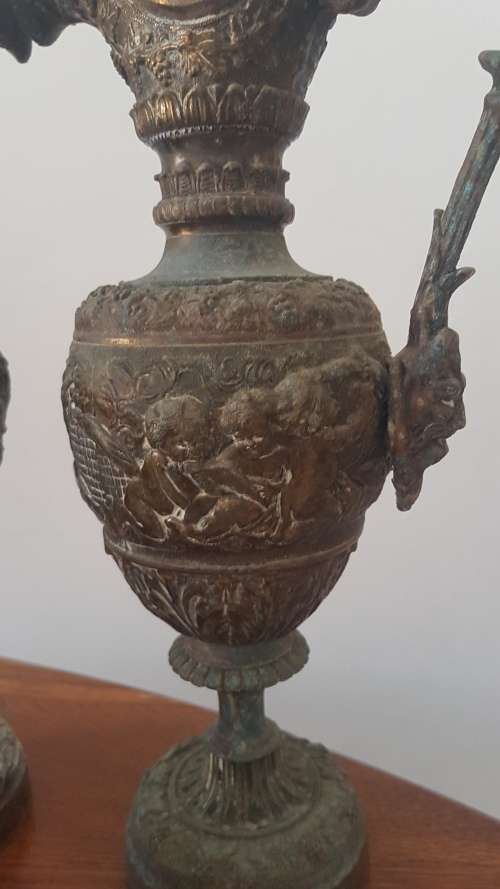 Pair of Vintage embossed 36cm cherub urns