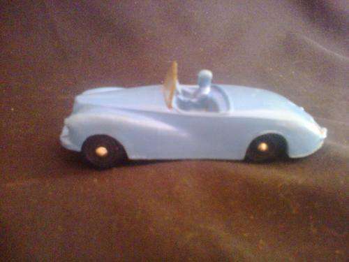 blue tomte car with 1 passenger