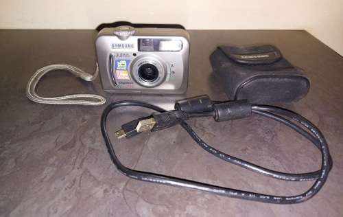 DIGITAL CAMERAS CANON POWERSHOT SX 150 IS AND (PLUS FREE SAMSUNG DIGIMAX)