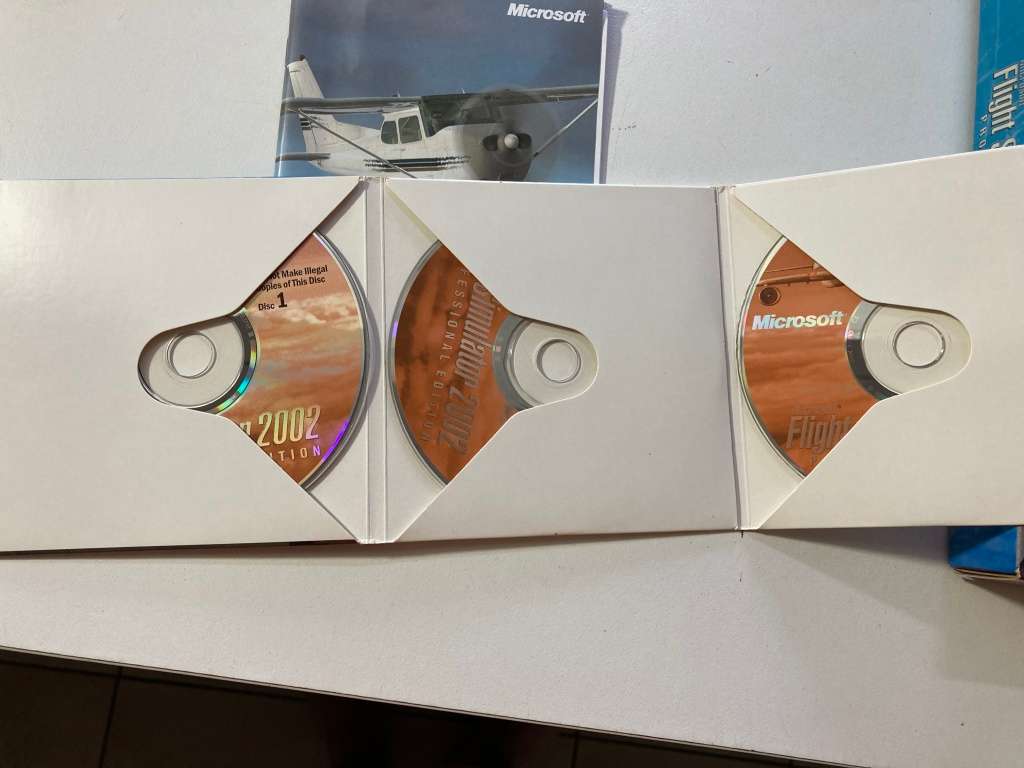 Microsoft Flight Simulator 2002 and A320 Professional with VHS cassette