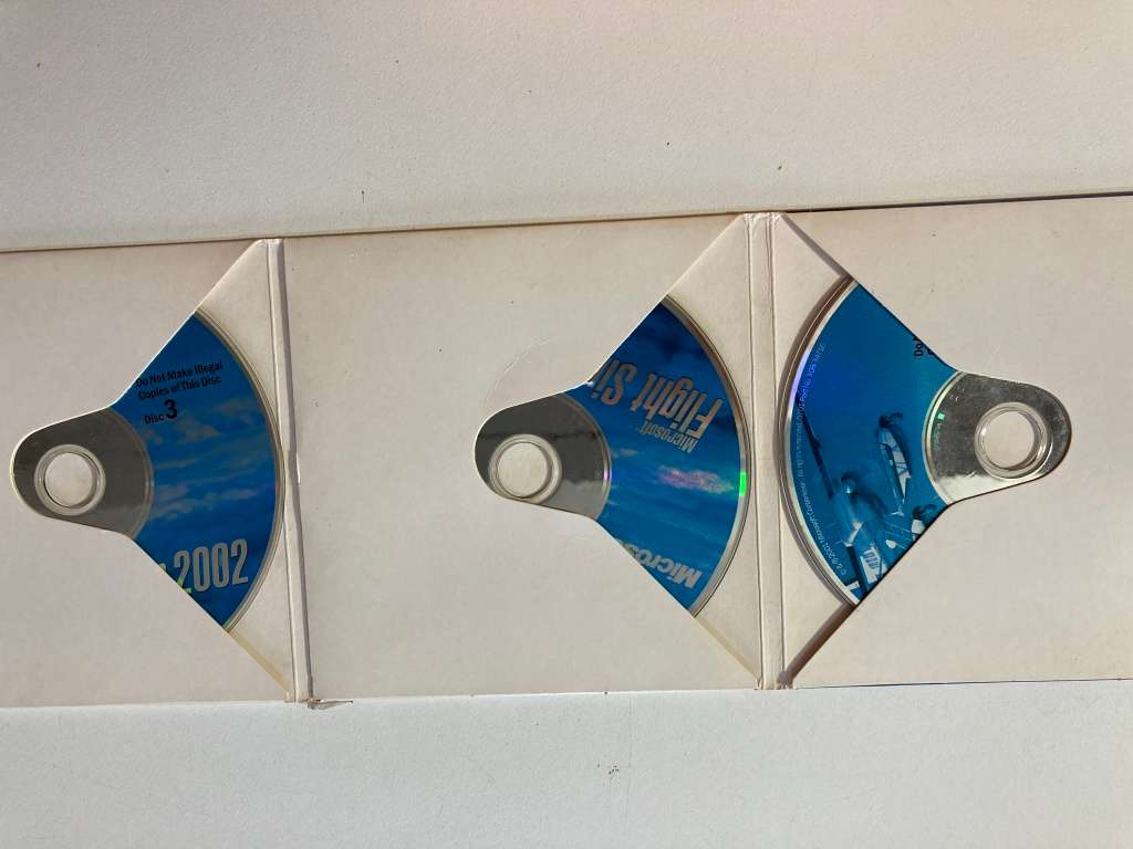 Microsoft Flight Simulator 2002 and A320 Professional with VHS cassette