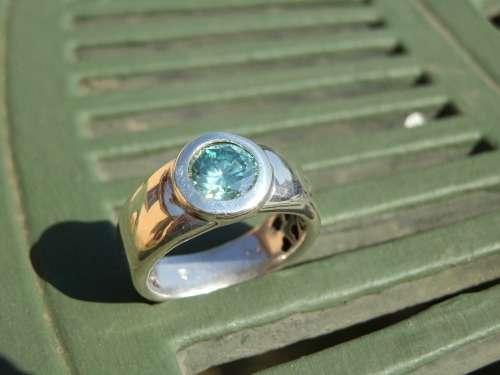 Sterling silver 1.47 ct green moissanite diamond ring - thirty (30) days to pay.  Value R8,760