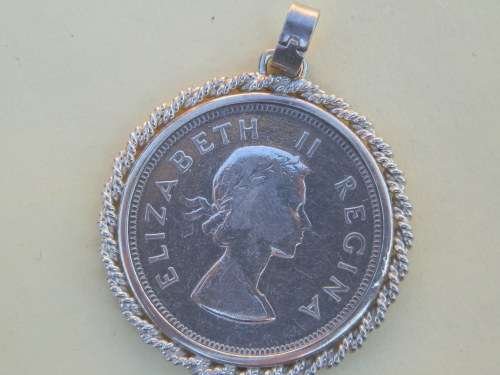 PRICE REDUCED!   Sterling silver 1955 coin pendant. 19.5 g.