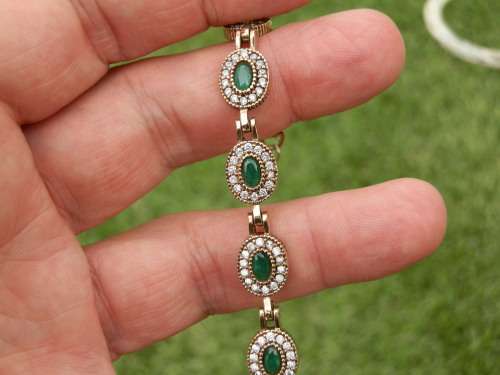 Sterling silver (17.9g) emerald and topaz bracelet