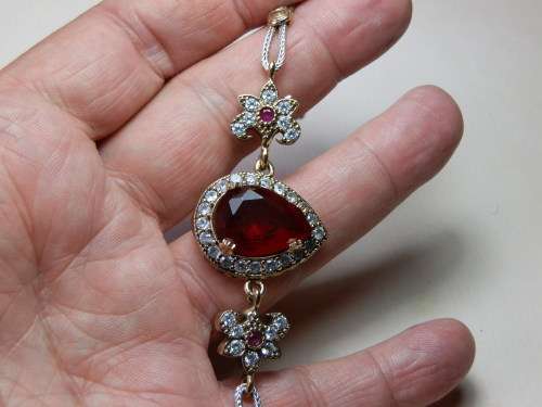 Sterling silver (19 g) ruby and topaz bracelet