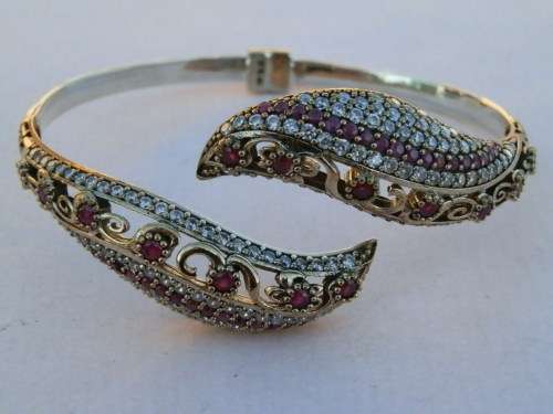 Sterling silver ruby bangle, 21.5 g.