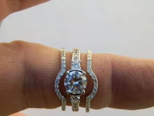 Sterling silver three-ring set.