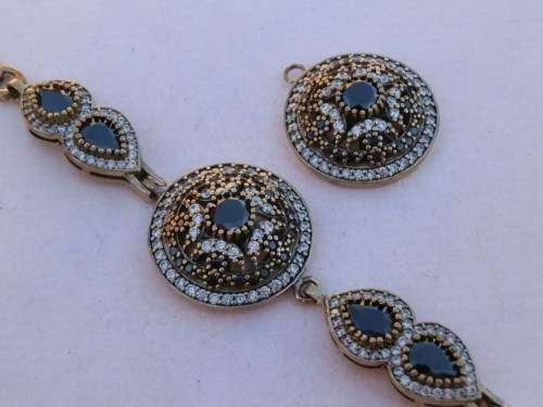 Sterling silver topaz bracelet and pendant combo, 12.4 g.