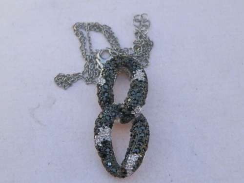Sterling silver pendant and chain, 5.6 g.