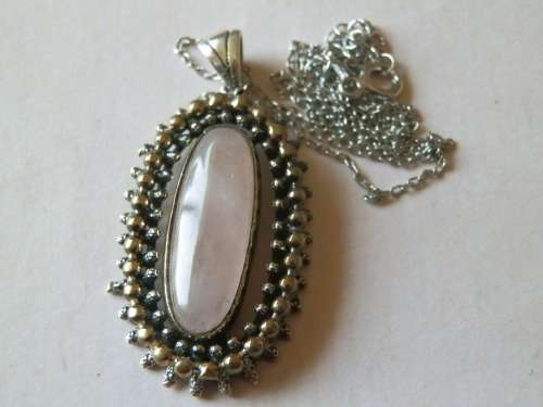 Sterling silver rose quartz pendant and chain, 10.8 g.