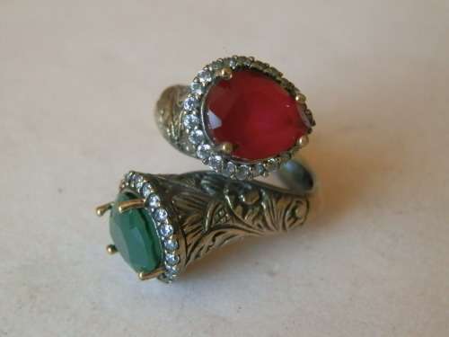 Sterling silver ruby and emerald ring, 9.3 g.