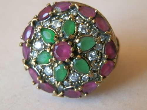 Sterling silver ruby and emerald ring, 11.7 g.