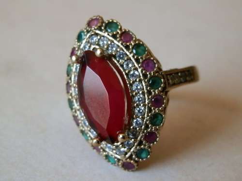 Sterling silver ruby and emerald ring, 5.6 g.