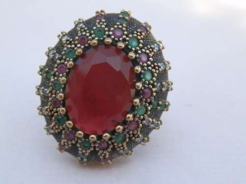 Sterling silver ruby and emerald ring, 14.7 g.