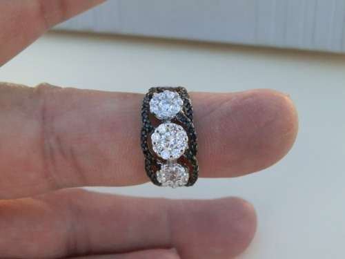 Charming SOLID sterling silver topaz ring - weight 4.5 g.  Thirty (30) days to pay.