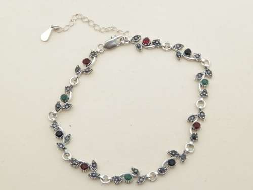 Charming sterling silver multi gem bracelet - weight 7 g.  Thirty (30) days to pay