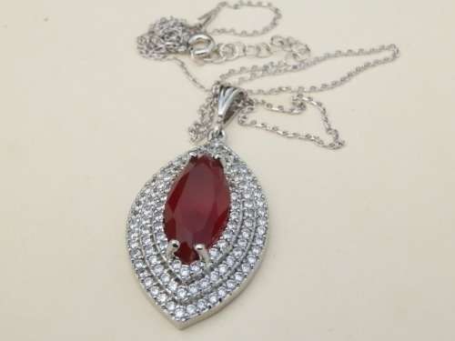 Elegant solid sterling silver pendant and chain - weight 7.3 g.  Thirty (30) days to pay