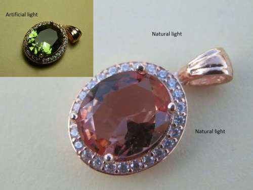 Stunning solid sterling silver color changing Zultanite pendant - weight 2.7 g.