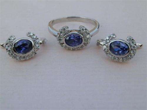 Sparkling solid sterling silver ring and earring set - weight 9.5 g.