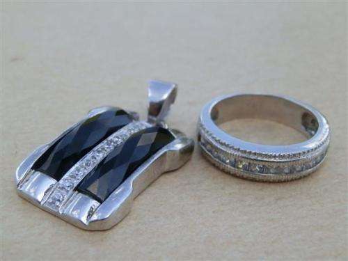Spectacular solid sterling silver ring and pendant combo - weight 12.8 g.