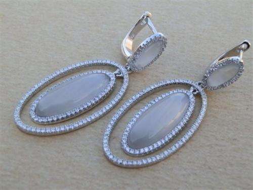 Sparkling solid sterling silver earrings - weight 14.11 g.