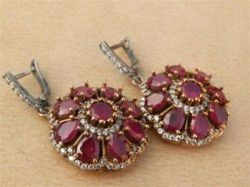 Exquisite heavy sterling silver ruby earrings - weight 17.28 g.