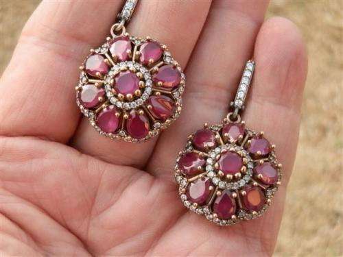 Exquisite heavy sterling silver ruby earrings - weight 17.28 g.
