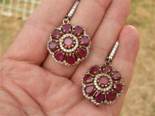Exquisite heavy sterling silver ruby earrings - weight 17.28 g.