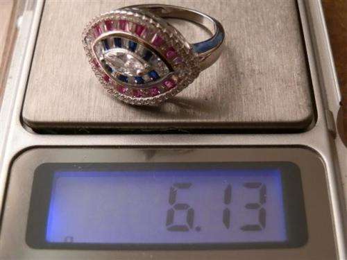 Sparkling solid sterling silver ruby and blue sapphire ring - weight 6.13 g.
