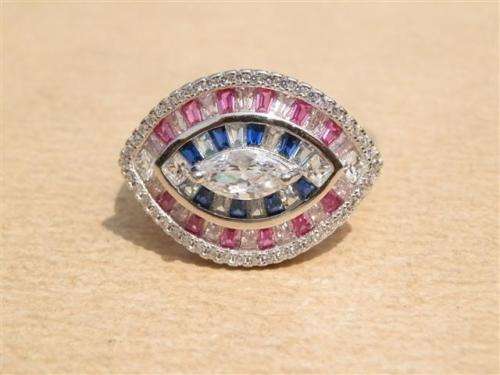 Sparkling solid sterling silver ruby and blue sapphire ring - weight 6.13 g.