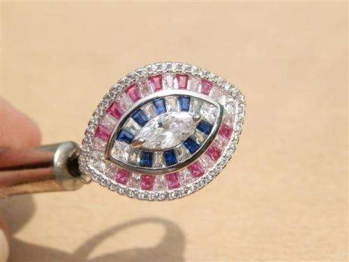 Sparkling solid sterling silver ruby and blue sapphire ring - weight 6.13 g.
