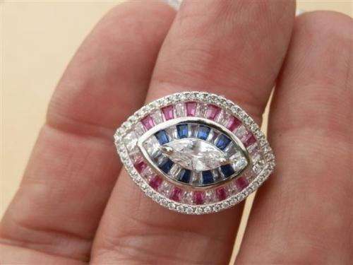 Sparkling solid sterling silver ruby and blue sapphire ring - weight 6.13 g.