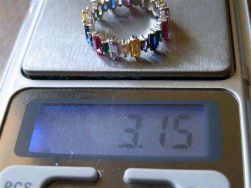 Alluring solid sterling silver ruby, blue sapphire and topaz ring - weight 3.15 g.