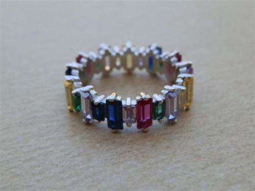 Alluring solid sterling silver ruby, blue sapphire and topaz ring - weight 3.15 g.