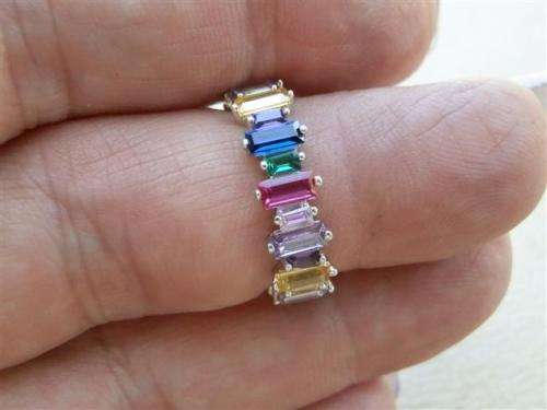 Alluring solid sterling silver ruby, blue sapphire and topaz ring - weight 3.15 g.