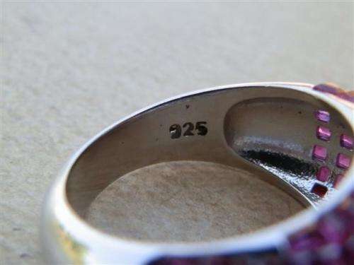 Spectacular solid sterling silver ruby and topaz ring - weight 9.32 g.