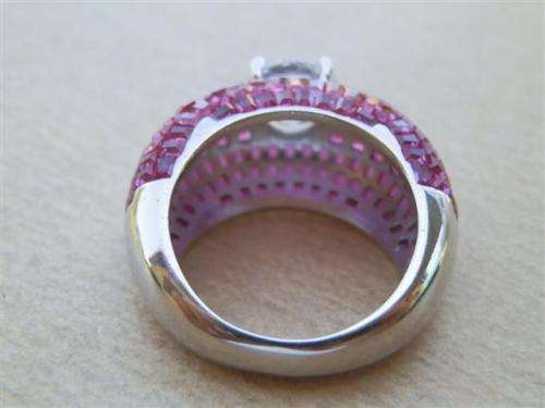 Spectacular solid sterling silver ruby and topaz ring - weight 9.32 g.