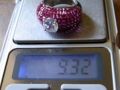 Spectacular solid sterling silver ruby and topaz ring - weight 9.32 g.