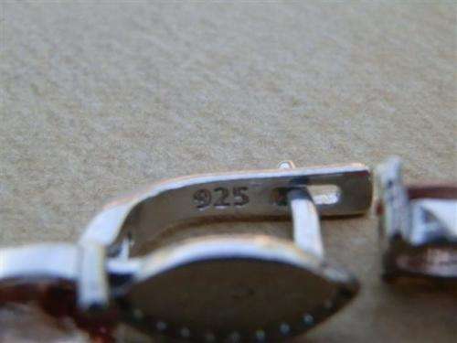 Charming solid sterling silver color changing Zultanite earrings - weight 5.17 g.