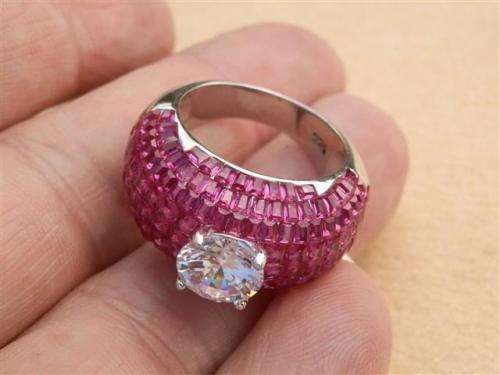 Spectacular solid sterling silver ruby and topaz ring - weight 9.32 g.